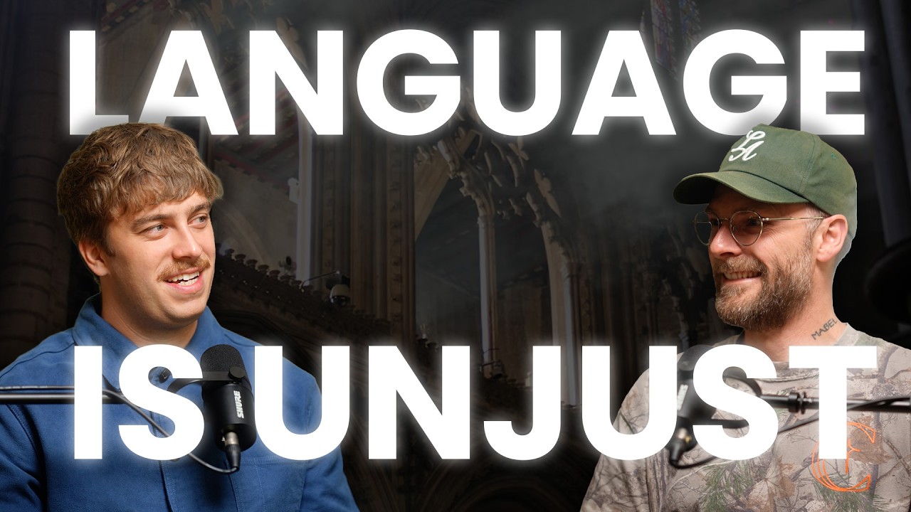 Two speakers in conversation, shot against a cathedral interior.